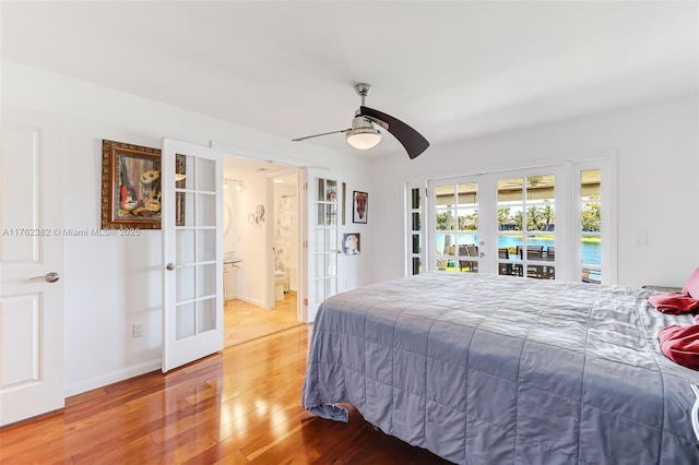 bedroom with baseboards, light wood finished floors, ceiling fan, french doors, and access to outside