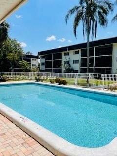 pool featuring fence