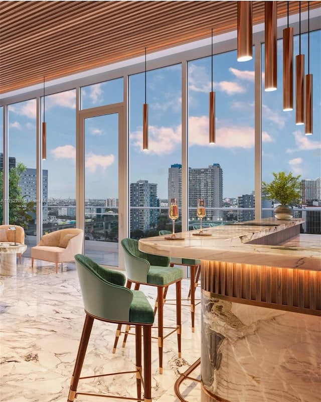 555 N Miami Ave Unit 4912, Miami, FL 33136 - unfurnished dining area with a city view, marble finish floor, and a wall of windows