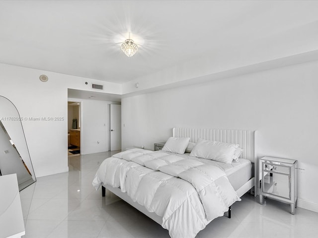 bedroom with light tile patterned floors, baseboards, and visible vents