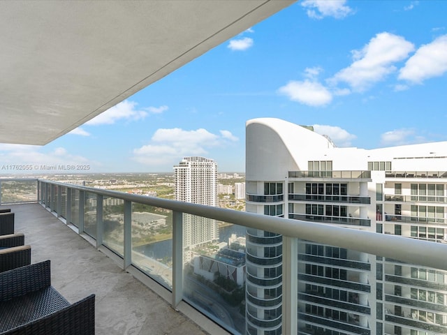 balcony featuring a view of city