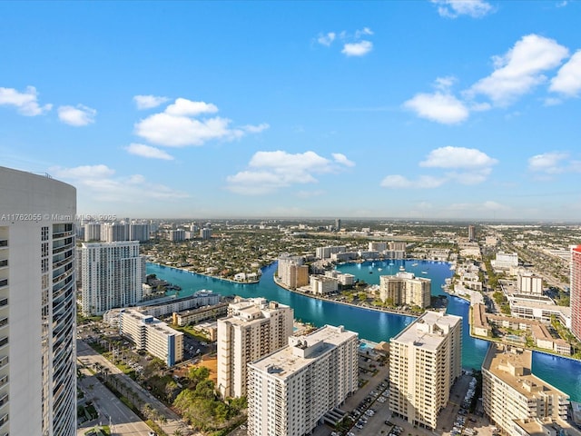 bird's eye view featuring a water view and a view of city