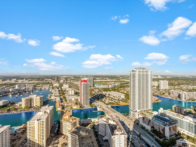 drone / aerial view with a view of city and a water view