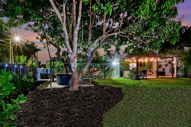 view of yard featuring a patio area and fence