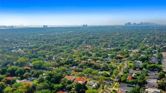 birds eye view of property with a view of city