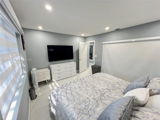 bedroom with recessed lighting, visible vents, and marble finish floor