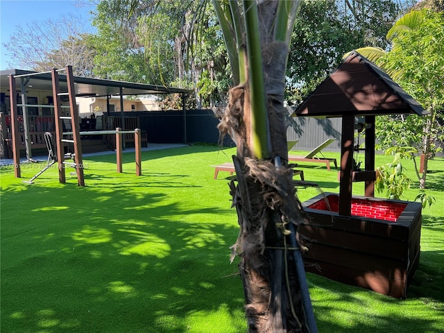 view of yard with fence