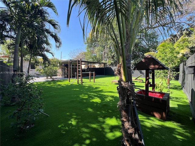 view of yard with a fenced backyard