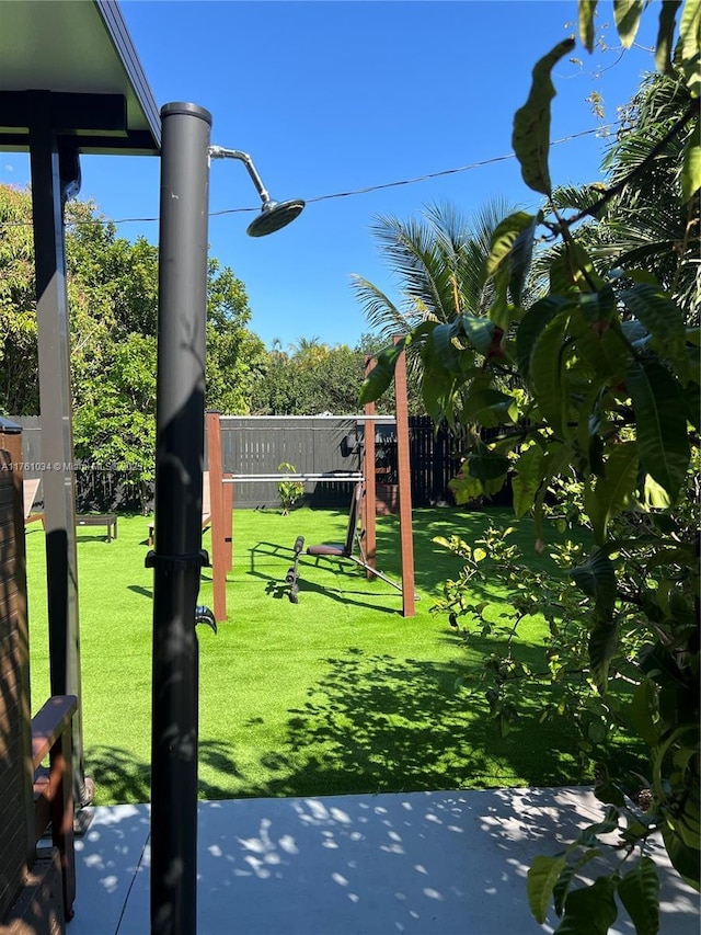 view of yard with fence