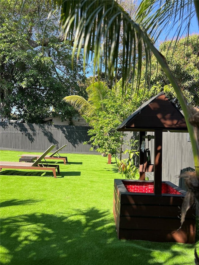 view of yard with fence