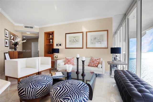 living area featuring visible vents, a healthy amount of sunlight, built in shelves, and ornamental molding