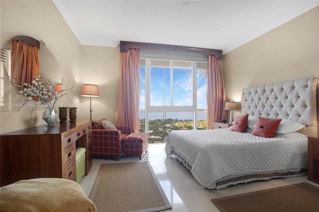 bedroom with ornamental molding