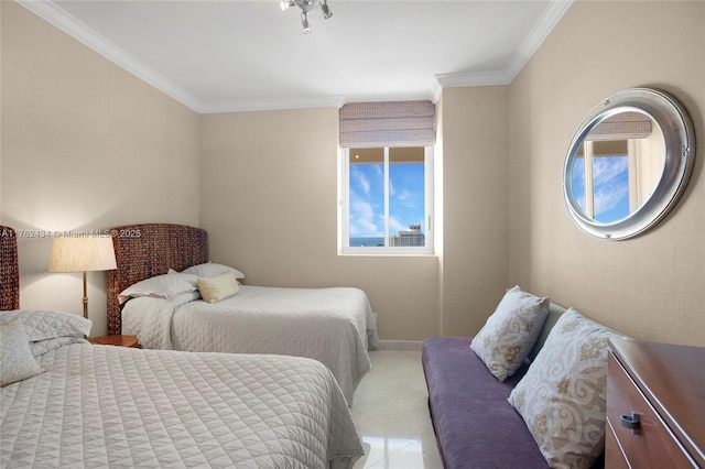 bedroom with baseboards and ornamental molding