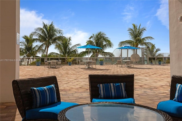 view of jungle gym featuring outdoor dining area