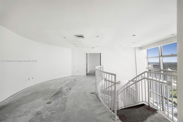1395 Brickell Ave Unit 3403, Miami, FL 33131 - spare room with visible vents and unfinished concrete flooring