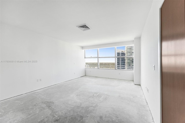 1395 Brickell Ave Unit 3403, Miami, FL 33131 - empty room with visible vents and concrete flooring