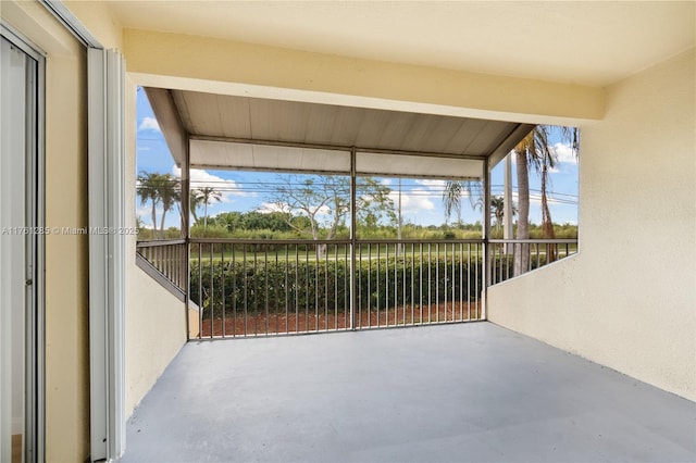 unfurnished sunroom featuring a healthy amount of sunlight