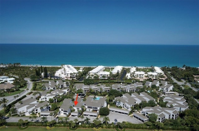 aerial view with a residential view and a water view