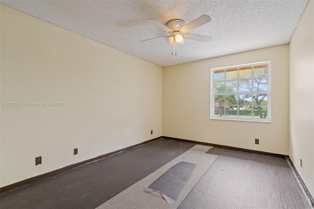 unfurnished room with baseboards, a textured ceiling, and ceiling fan