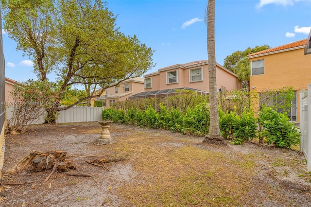 view of yard featuring fence