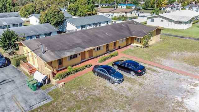 birds eye view of property with a residential view