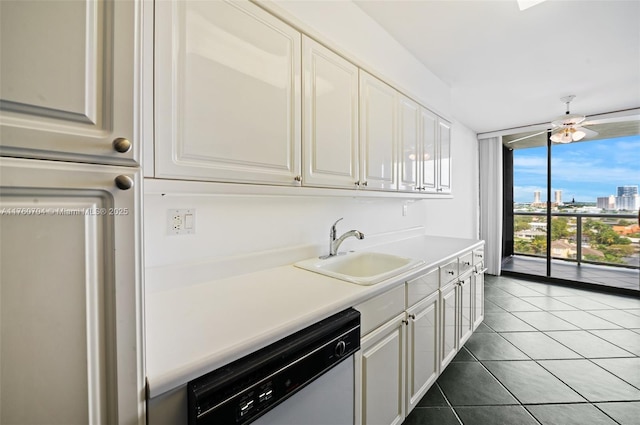 3600 Yacht Club Dr Unit 1102, Aventura, FL 33180 - kitchen featuring a sink, expansive windows, white cabinetry, tile patterned flooring, and dishwasher