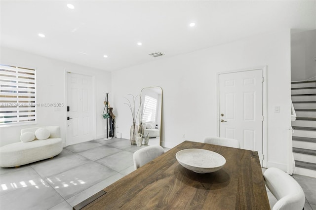 dining area featuring stairway, recessed lighting, and visible vents