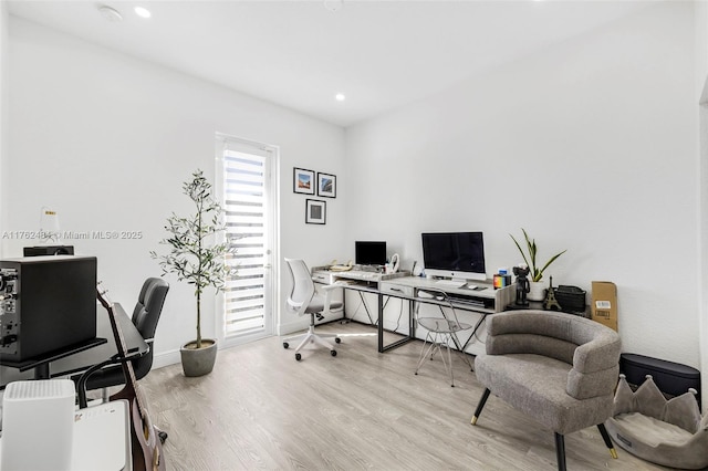 office space featuring recessed lighting, wood finished floors, and baseboards