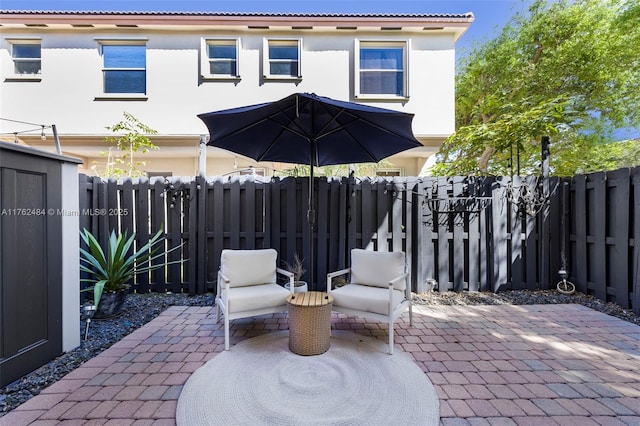 view of patio featuring a fenced backyard