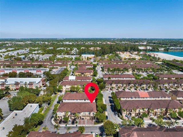 aerial view with a residential view and a water view