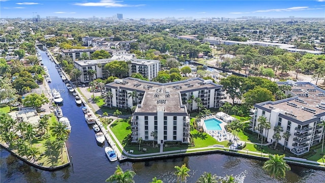 drone / aerial view with a water view