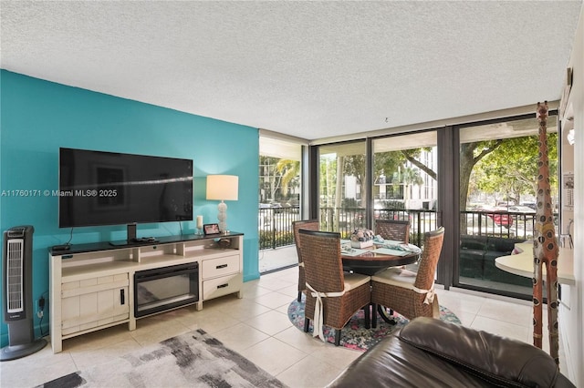 interior space featuring light tile patterned flooring and a textured ceiling