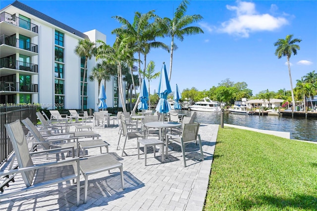 view of patio featuring a water view