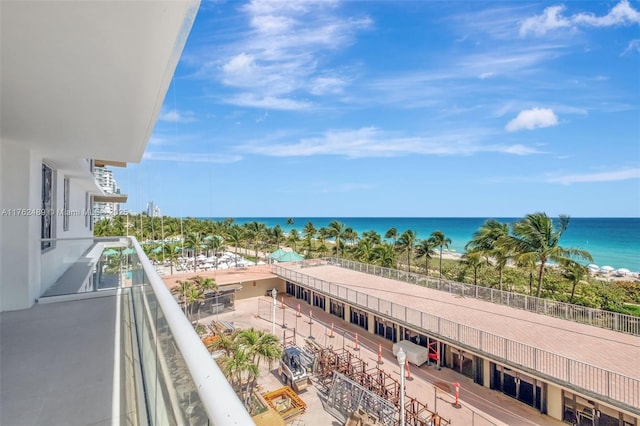 balcony featuring a water view