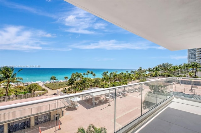 balcony featuring a water view