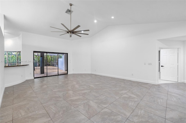 spare room with high vaulted ceiling, a ceiling fan, visible vents, and baseboards