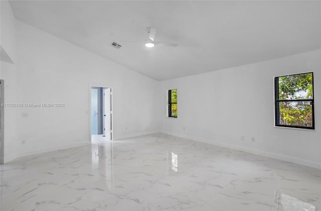 spare room with baseboards, visible vents, marble finish floor, and ceiling fan