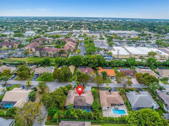 birds eye view of property with a residential view