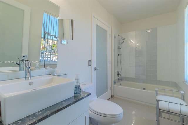 bathroom with toilet, shower / washtub combination, vanity, and tile patterned flooring