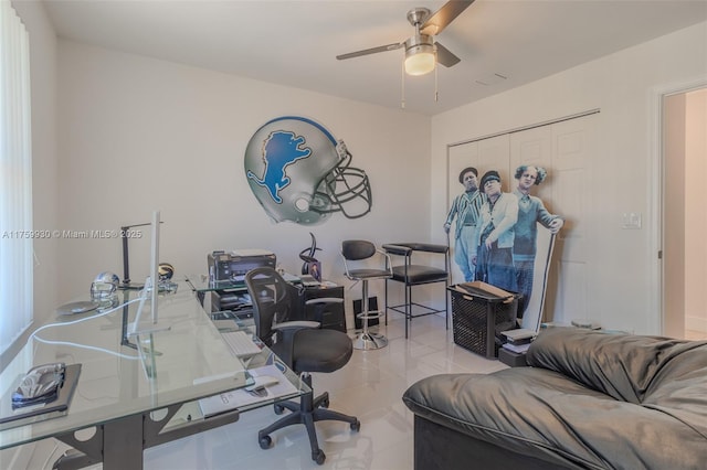 office featuring tile patterned floors and a ceiling fan