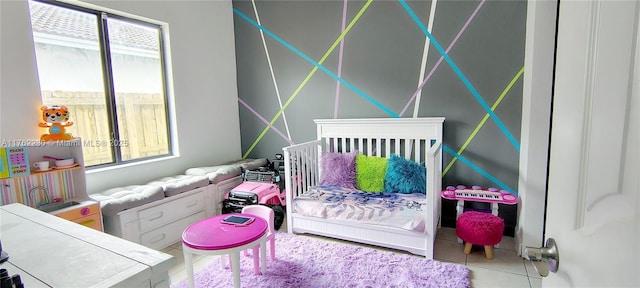bedroom featuring tile patterned flooring