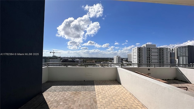 balcony featuring a view of city