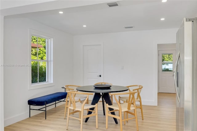 dining area with recessed lighting, visible vents, baseboards, and light wood-style flooring