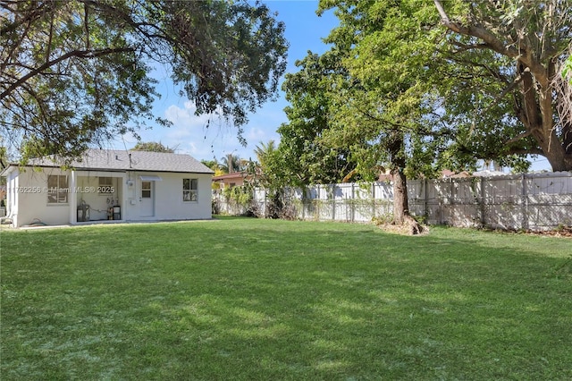 view of yard with fence