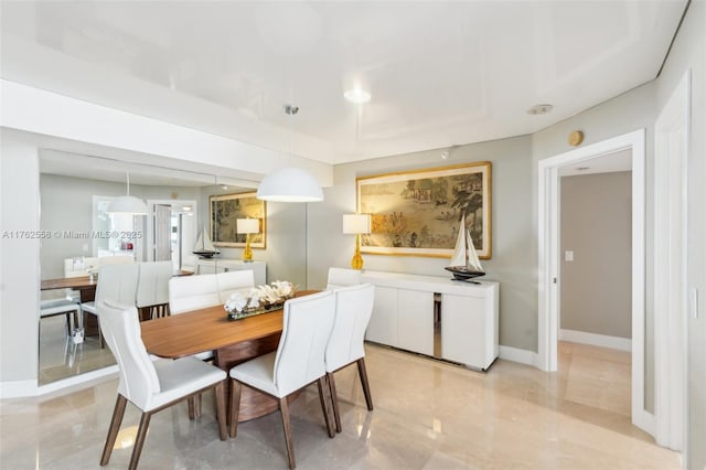 16711 Collins Ave Unit 704, Sunny Isles Beach, FL 33160 - dining space featuring baseboards