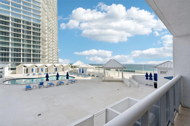 16711 Collins Ave Unit 704, Sunny Isles Beach, FL 33160 - view of patio / terrace featuring a gazebo and a community pool