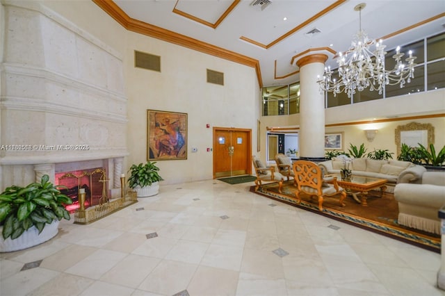 16711 Collins Ave Unit 704, Sunny Isles Beach, FL 33160 - common area featuring a towering ceiling and ornamental molding