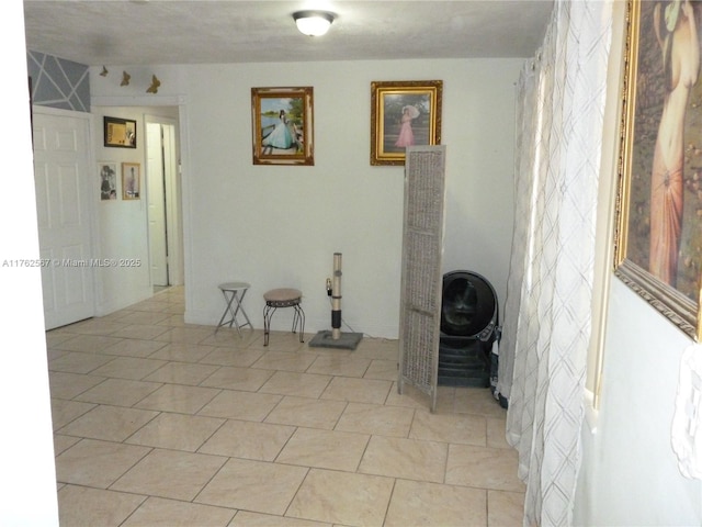 interior space featuring light tile patterned floors