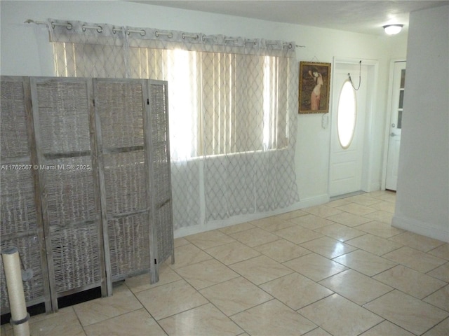 foyer with baseboards