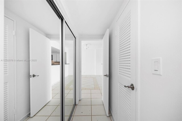 5601 Collins Ave Unit 1604, Miami Beach, FL 33140 - hallway with light tile patterned floors
